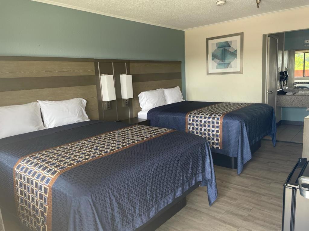 Executive Inn & Suites Beaumont Esterno foto