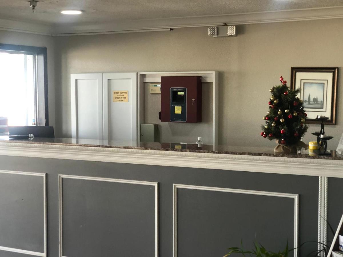 Executive Inn & Suites Beaumont Esterno foto